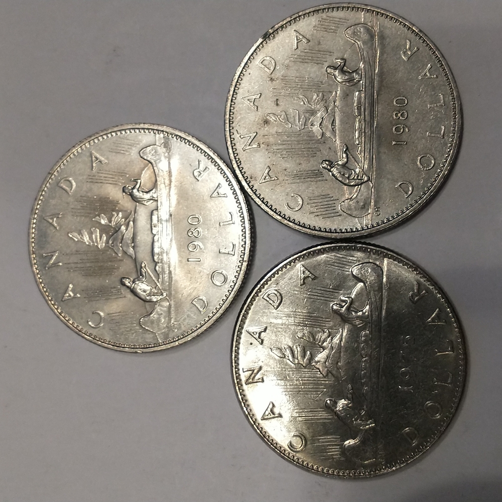 3 Canadian Silver Dollar coins